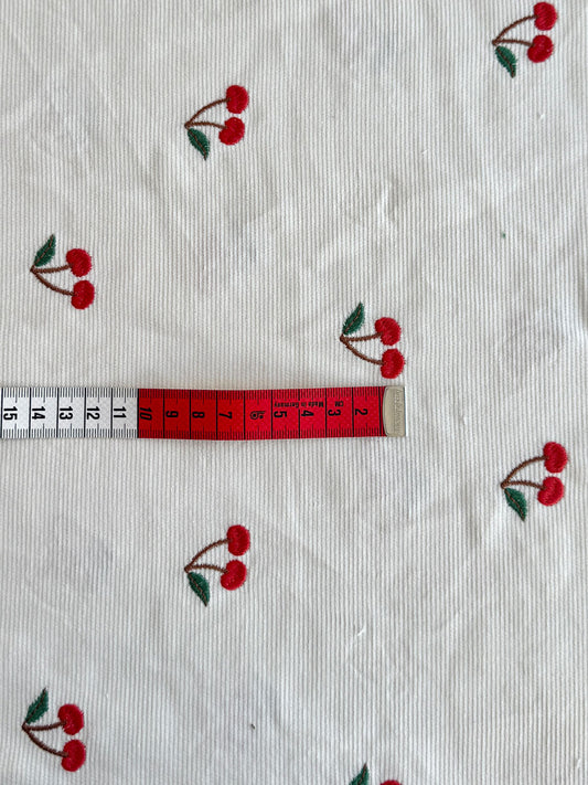 Cherry embroidered needlecord - per half metre