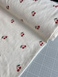 Cherry embroidered needlecord - per half metre