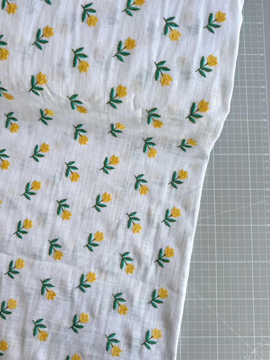 Yellow floral embroidered cotton linen - per half metre