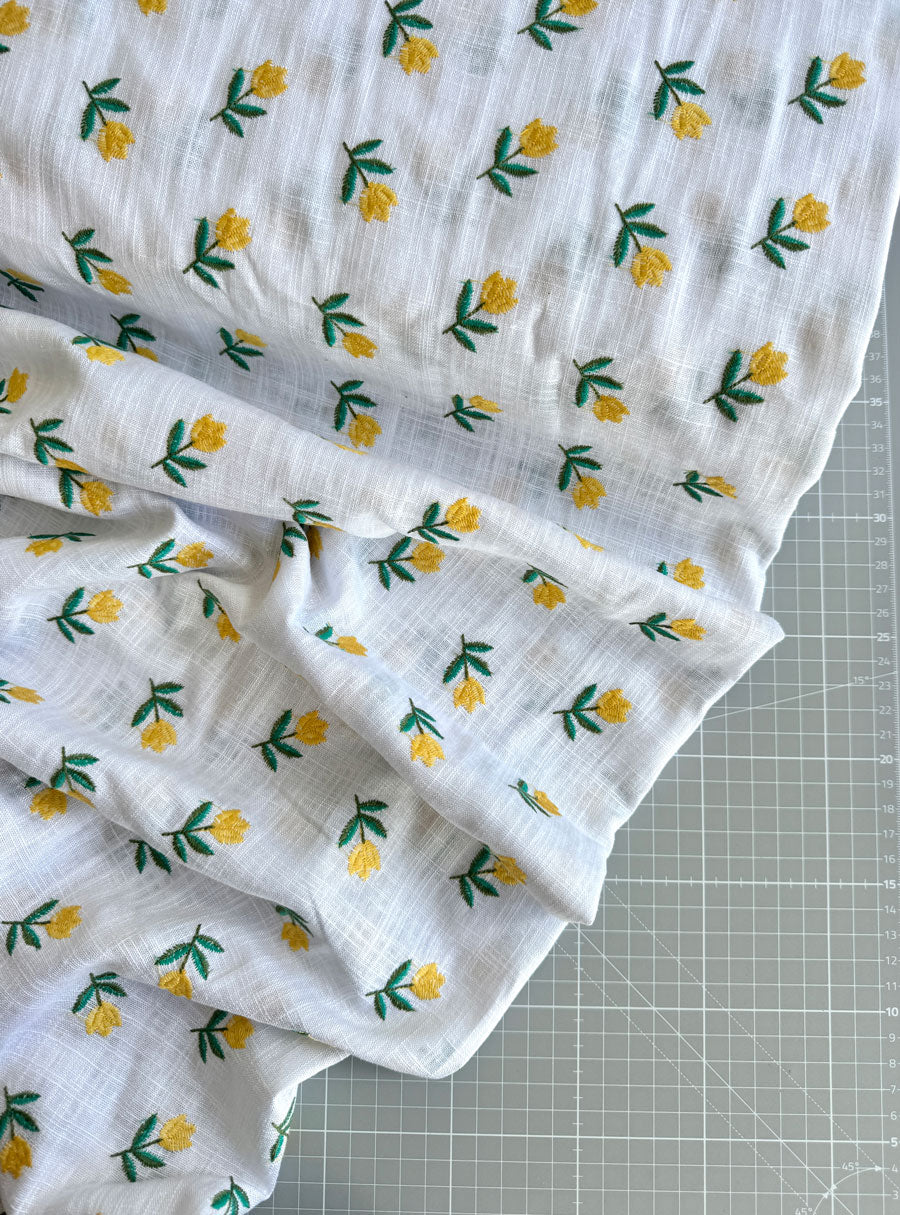 Yellow floral embroidered cotton linen - per half metre